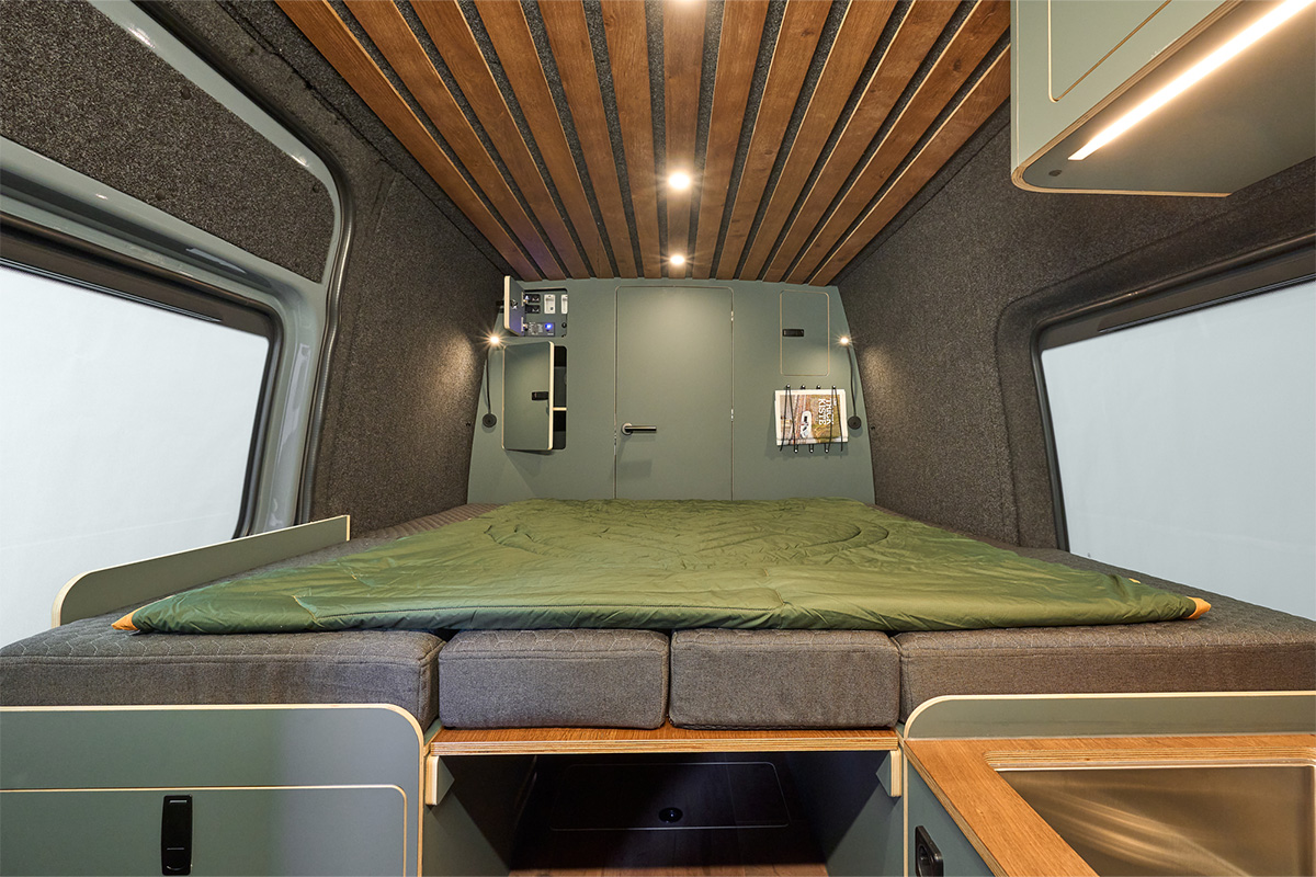 Bathroom in the back of the camper. 4-piece mattress from Laroma for sitting and sleeping comfort. 